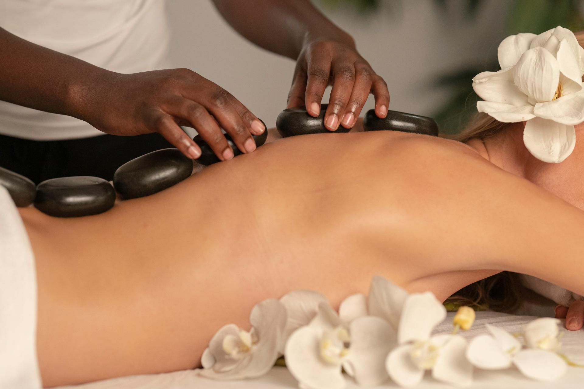Hot stone massage therapy session
